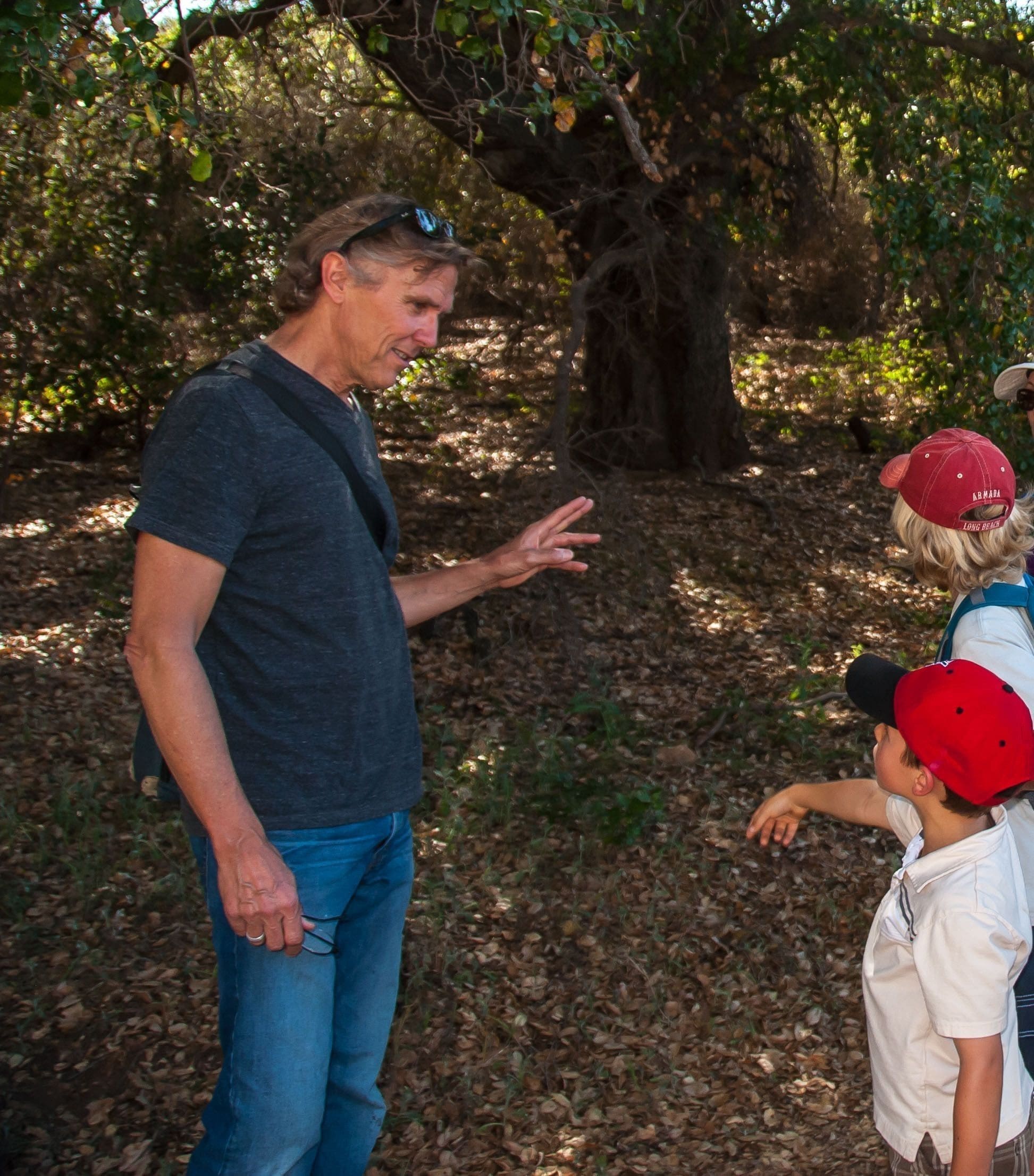 Chaparral Institute director Richard Halsey in the field with young students